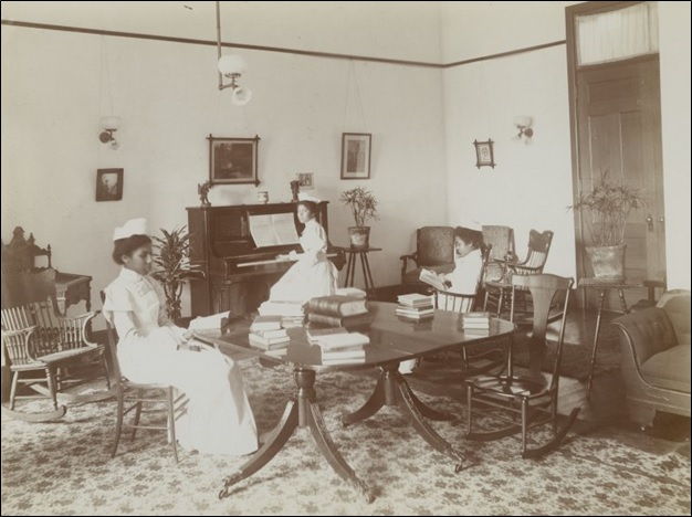 Nurses in lounge at Colored Home and Hospital, New York City.
