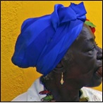 A lady smokes her cigar in the Vieja district of Havana, Cuba