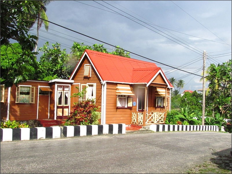 Chattel house with red roof